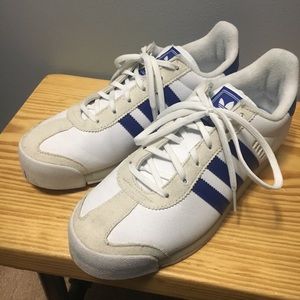 Adidas white and blue Samoa with gold accent